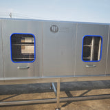 Poultry cage washing machine