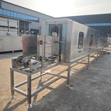 Poultry cage washing machine